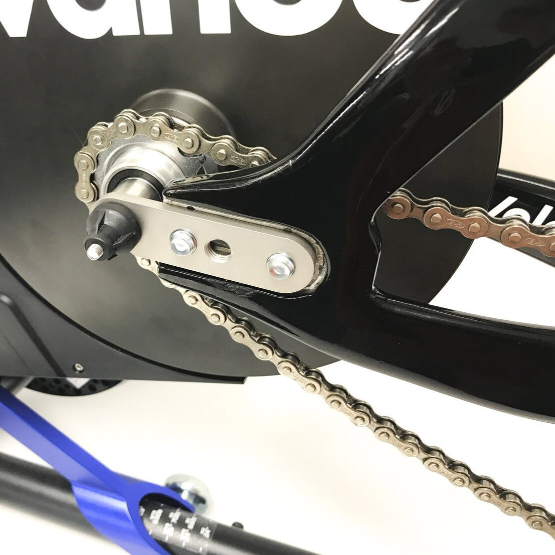 Track bike dropout extenders for indoor trainers